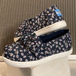 Navy and Daisy Toms shoes